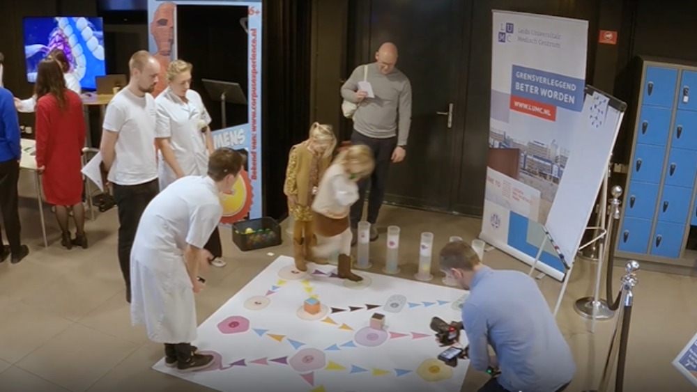 Children playing the floor game at an event