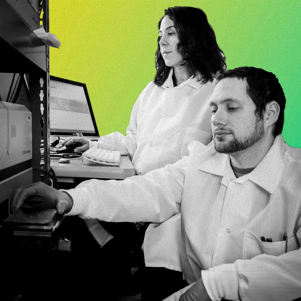 Two scientists running an experiment
