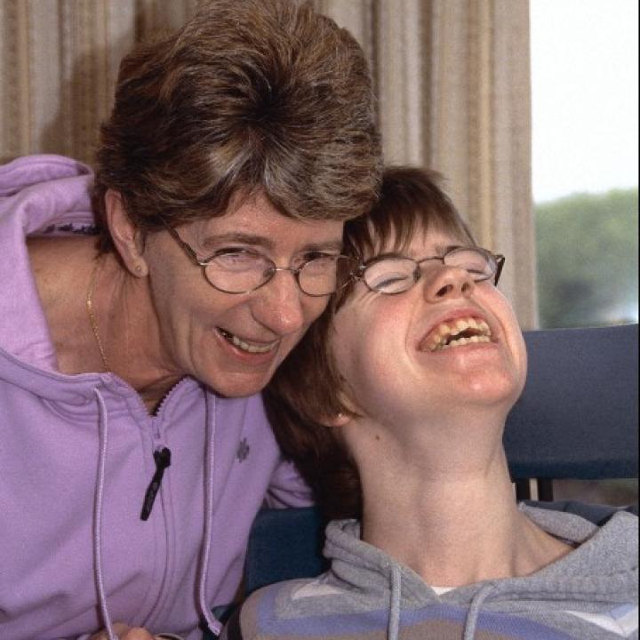 Mother and her daughter with cerebral palsy